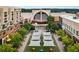 Aerial view of a shopping center, featuring Regal Cinemas and outdoor lounge areas at 12120 Dancliff Trce, Alpharetta, GA 30009