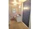 Bathroom featuring vanity, toilet, and shower/tub combo at 1256 E Piedmont Rd, Marietta, GA 30062