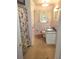 Bathroom featuring vanity, toilet, and shower/tub combo at 1256 E Piedmont Rd, Marietta, GA 30062