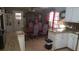 Charming dining room with a vintage hutch, dining table, and tiled floors at 1256 E Piedmont Rd, Marietta, GA 30062