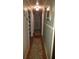 Hallway with wood flooring and built-in shelving at 1256 E Piedmont Rd, Marietta, GA 30062