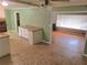 Spacious kitchen boasts granite countertops, tile floor, and backyard view at 1256 E Piedmont Rd, Marietta, GA 30062