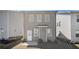 Gray siding and backyard with door and patio featured in this townhouse at 3717 Silvery Way, Powder Springs, GA 30127