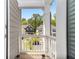 Cozy balcony offering a pleasant view of the neighborhood and surrounding trees at 3717 Silvery Way, Powder Springs, GA 30127