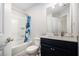 Cozy bathroom with a tub-shower combination, a modern vanity, and a convenient toilet at 3717 Silvery Way, Powder Springs, GA 30127