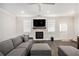 Cozy living room featuring fireplace and an attached wooden mantle at 3717 Silvery Way, Powder Springs, GA 30127