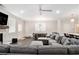 Open concept living area with stylish decor, dining area, and a sleek fan at 3717 Silvery Way, Powder Springs, GA 30127