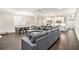 Expansive living area with combined spaces with natural lighting and hardwood flooring at 3717 Silvery Way, Powder Springs, GA 30127