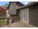 Back of house featuring a wood deck with a view of the backyard at 570 Bell Se Rd, Conyers, GA 30094