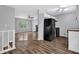 Open concept kitchen featuring an eat-in kitchen and black appliances at 570 Bell Se Rd, Conyers, GA 30094