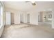 Bright living room with multiple entryways perfect for entertaining with easy access to amenities at 6028 Connaught Se Dr, Mableton, GA 30126