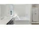 Inviting bathroom features a soaking tub, separate shower, and stylish vanity area at 6625 Story Cir, Norcross, GA 30093