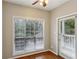 Bright dining area features a large window and access to a balcony, offering natural light and outdoor views at 1250 Parkwood Se Cir # 2201, Atlanta, GA 30339