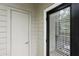 Exterior view of door and wall of the house, showcasing the property's entrance and architectural details at 1250 Parkwood Se Cir # 2201, Atlanta, GA 30339