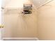 Walk in closet features rods for hanging and space for storage at 1630 Chadwick Mill Ln, Lawrenceville, GA 30043
