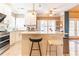 Modern kitchen features stainless steel appliances, a central island, and an open layout at 1630 Chadwick Mill Ln, Lawrenceville, GA 30043
