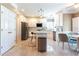 Bright eat-in kitchen with stainless steel appliances, stone countertops, and modern decor at 1630 Chadwick Mill Ln, Lawrenceville, GA 30043