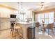 Eat-in kitchen featuring a large island, stainless steel appliances, and lots of cabinet space at 1630 Chadwick Mill Ln, Lawrenceville, GA 30043