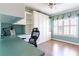 Office features custom built-ins, desk, and natural light at 1630 Chadwick Mill Ln, Lawrenceville, GA 30043