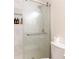 Modern shower with glass door and tiled walls at 1630 Chadwick Mill Ln, Lawrenceville, GA 30043
