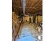 Basement with exposed beams and plastic sheeting at 1910 Cooper Landing Se Dr, Smyrna, GA 30080
