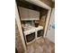 Convenient laundry area with washer, dryer, and storage cabinets at 1910 Cooper Landing Se Dr, Smyrna, GA 30080