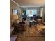 Inviting living room with a large window, piano, and comfortable seating area at 1910 Cooper Landing Se Dr, Smyrna, GA 30080