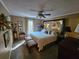 Serene bedroom with a ceiling fan, decorative headboard, and comfortable furnishings at 1910 Cooper Landing Se Dr, Smyrna, GA 30080