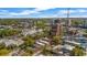 Scenic aerial view showcasing cityscape, lush trees, and condo building; highlighting a balanced urban setting at 3235 Roswell Ne Rd # 508, Atlanta, GA 30305