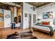 Open bedroom area with hardwood floors, modern decor, and seamless flow to living spaces at 3235 Roswell Ne Rd # 508, Atlanta, GA 30305