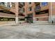 Brick building entrance features a covered portico and direct access to the parking garage at 3235 Roswell Ne Rd # 508, Atlanta, GA 30305
