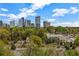 Picturesque city view of skyline, greenery, and homes; showcasing an desirable urban living experience at 3235 Roswell Ne Rd # 508, Atlanta, GA 30305