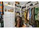Custom walk-in closet featuring built-in shelving and drawers for optimal storage of clothing and accessories at 3235 Roswell Ne Rd # 508, Atlanta, GA 30305
