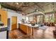 Modern kitchen with stainless steel appliances and large island, opening to living room for entertaining at 3235 Roswell Ne Rd # 508, Atlanta, GA 30305