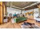 Spacious living room showcasing concrete ceilings, hardwood floors, modern decor, and an open floor plan at 3235 Roswell Ne Rd # 508, Atlanta, GA 30305