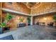 Spacious lobby with high ceilings, exposed brick walls, stylish furniture and decor, and concrete floors at 3235 Roswell Ne Rd # 508, Atlanta, GA 30305