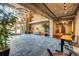 Bright lobby with high ceilings, exposed brick, stylish decor and furniture, and concrete flooring at 3235 Roswell Ne Rd # 508, Atlanta, GA 30305
