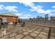 A rooftop terrace with metal railing and outdoor seating overlooking a city skyline at 3235 Roswell Ne Rd # 508, Atlanta, GA 30305