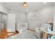 This Bedroom includes a gray chair and a patterned floor rug at 2930 Ringle Rd, Brookhaven, GA 30341