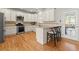 Modern kitchen with stainless steel appliances, granite countertops, and a door that leads to the patio at 2930 Ringle Rd, Brookhaven, GA 30341