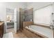 Bathroom with large tub and glass shower at 2930 Ringle Rd, Brookhaven, GA 30341