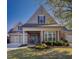 Charming brick home with a manicured lawn and inviting front porch at 314 Lakeside Trce, Canton, GA 30115