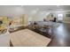 Spacious game room with ping pong table, hardwood floors, and natural light at 314 Lakeside Trce, Canton, GA 30115