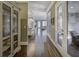 Hallway featuring hardwood flooring and a view of the kitchen at 314 Lakeside Trce, Canton, GA 30115