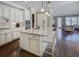 Bright, open kitchen with a large island and seating for four at 314 Lakeside Trce, Canton, GA 30115