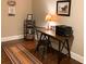 Cozy office with dark wood floors, bear-themed decor, and natural light at 314 Lakeside Trce, Canton, GA 30115