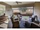 Covered patio with comfortable seating, perfect for outdoor relaxation and entertaining at 314 Lakeside Trce, Canton, GA 30115