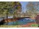 Scenic pond with a fountain and trees on a sunny day at 314 Lakeside Trce, Canton, GA 30115