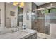 Bathroom featuring granite vanity top, subway tile and shower at 4950 Willow Creek Dr, Woodstock, GA 30188