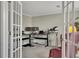 Bright home office with neutral carpet, offering a comfortable and productive workspace at 4950 Willow Creek Dr, Woodstock, GA 30188